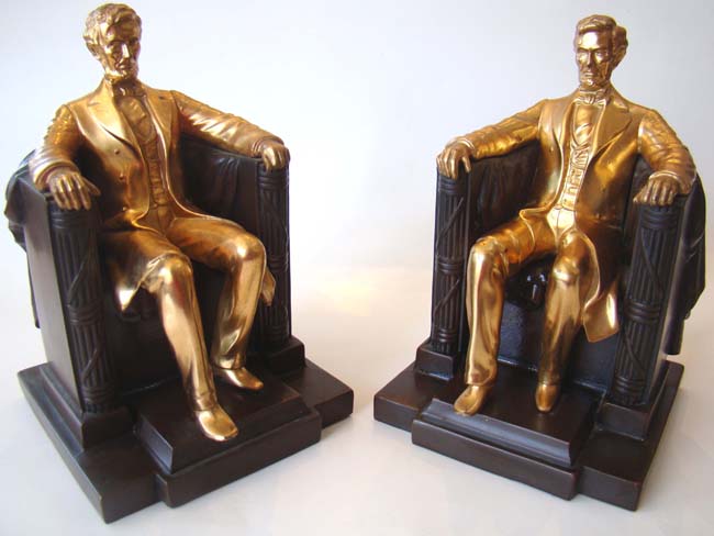 A near 'mint condition' pair of "Lincoln in the chair" bookends circa 1930 by Jennings Brothers of Bridgeport, CT.